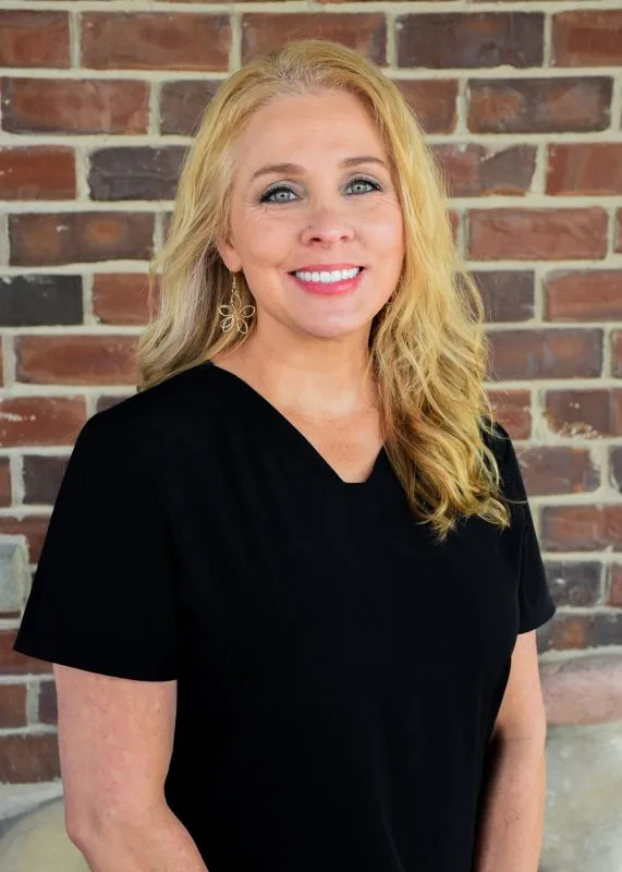 Smiling woman from the staff